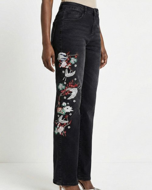 Le Jean "Grue d'Orient" à Broderies